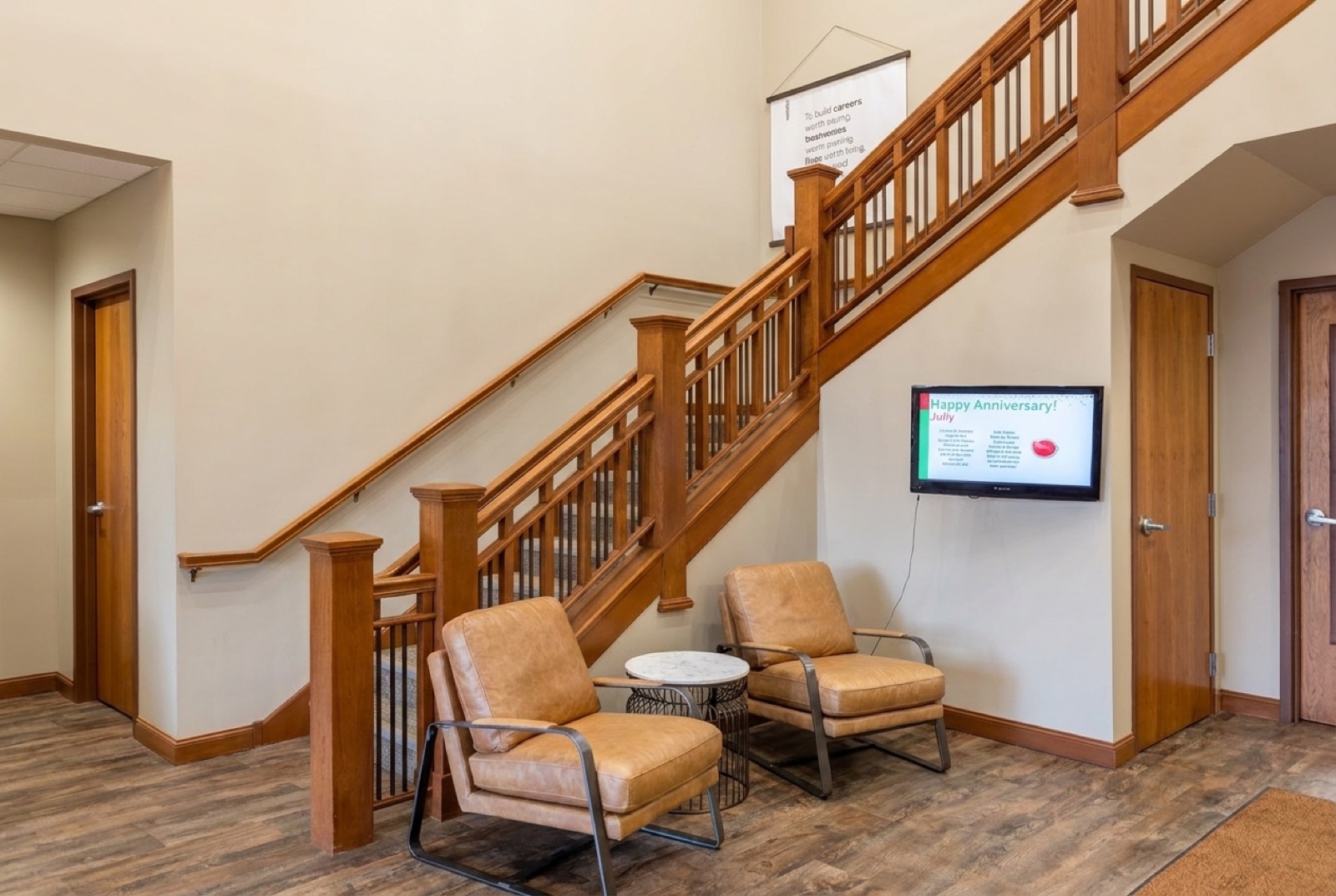 The lobby and wood staircase at the KWCR Coon Rapids office